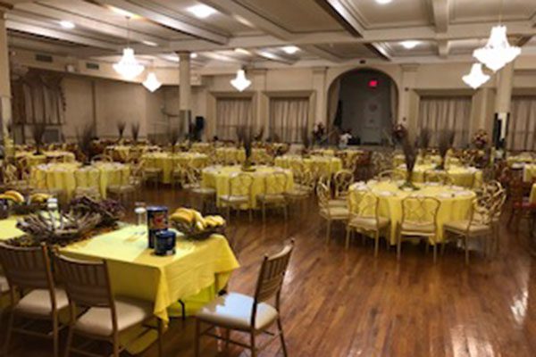 A large room with many tables and chairs